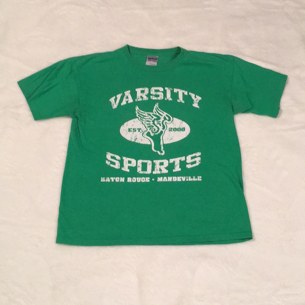 Varsity Sports Green T-shirt with White Lettering.